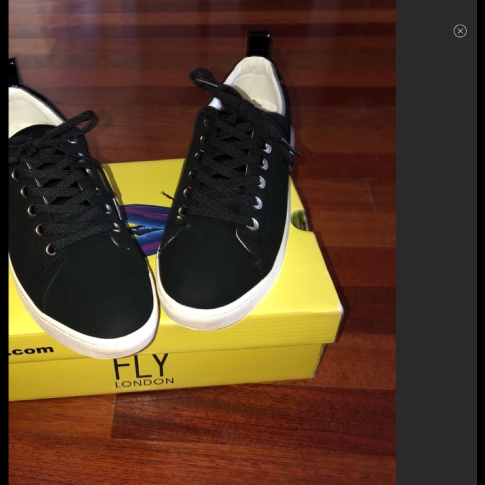 Fly London black lace up sneakers